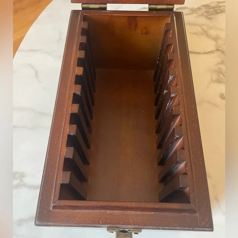 Wooden box for displaying coins with the name marked Danze logo